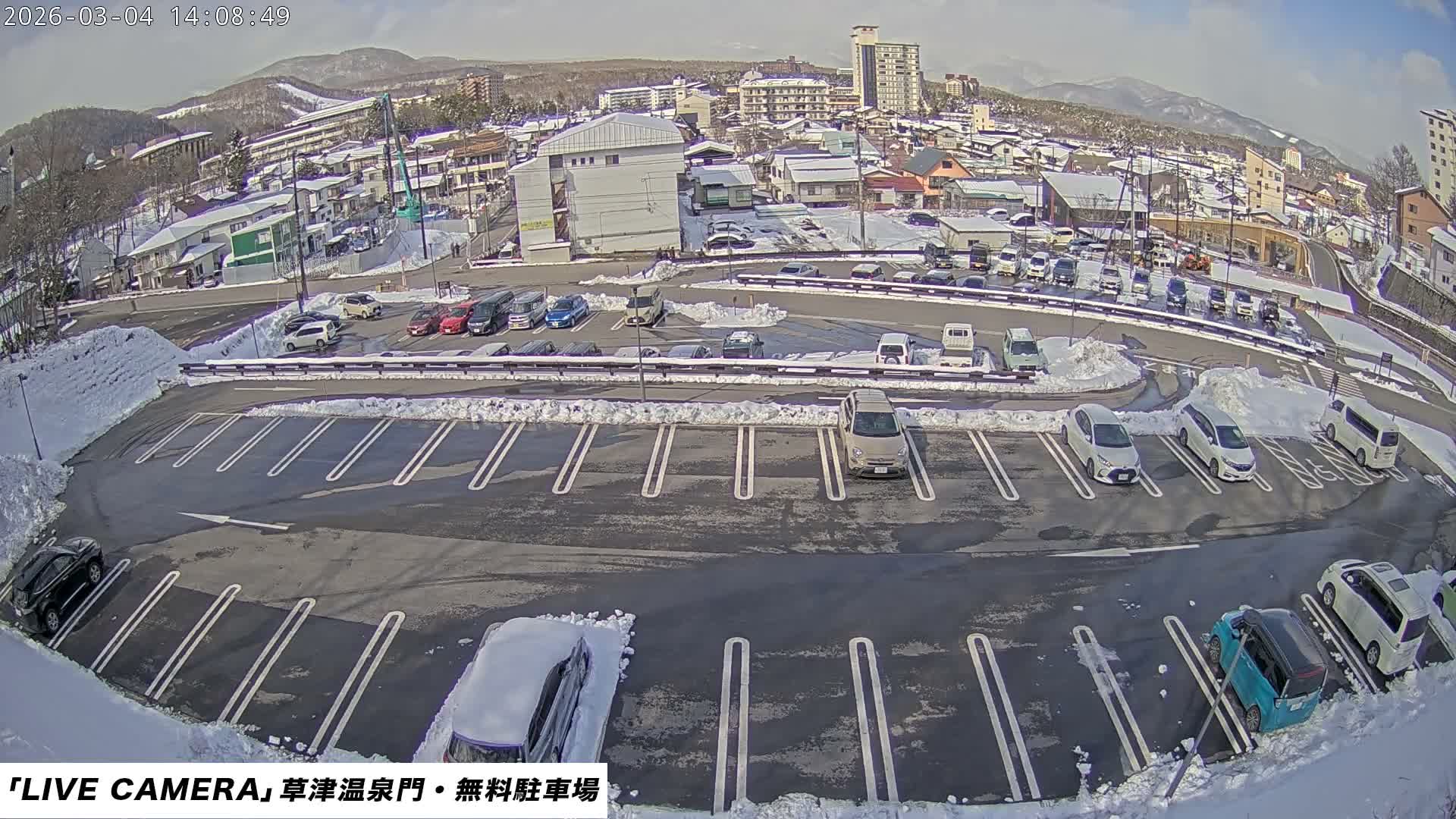 Gunma, Kusatsu Onsen Gate Car Parking Hot Spring Mon Parking Lot & Kusatsu Skyline View towards Northeast ( 群馬県草津温泉門前駐車場と北東方向の草津スカイラインの眺め ) Live Cam  - Kusatsu, Agatsuma-gun , Gunma, Kantō, Honshu, 