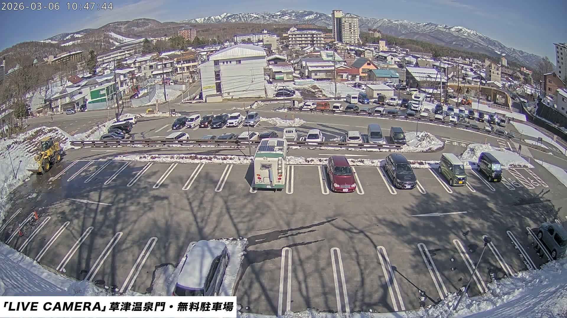 Gunma, Kusatsu Onsen Gate Car Parking Hot Spring Mon Parking Lot & Kusatsu Skyline View towards Northeast ( 群馬県草津温泉門前駐車場と北東方向の草津スカイラインの眺め ) Live Cam  - Kusatsu, Agatsuma-gun , Gunma, Kantō, Honshu, 