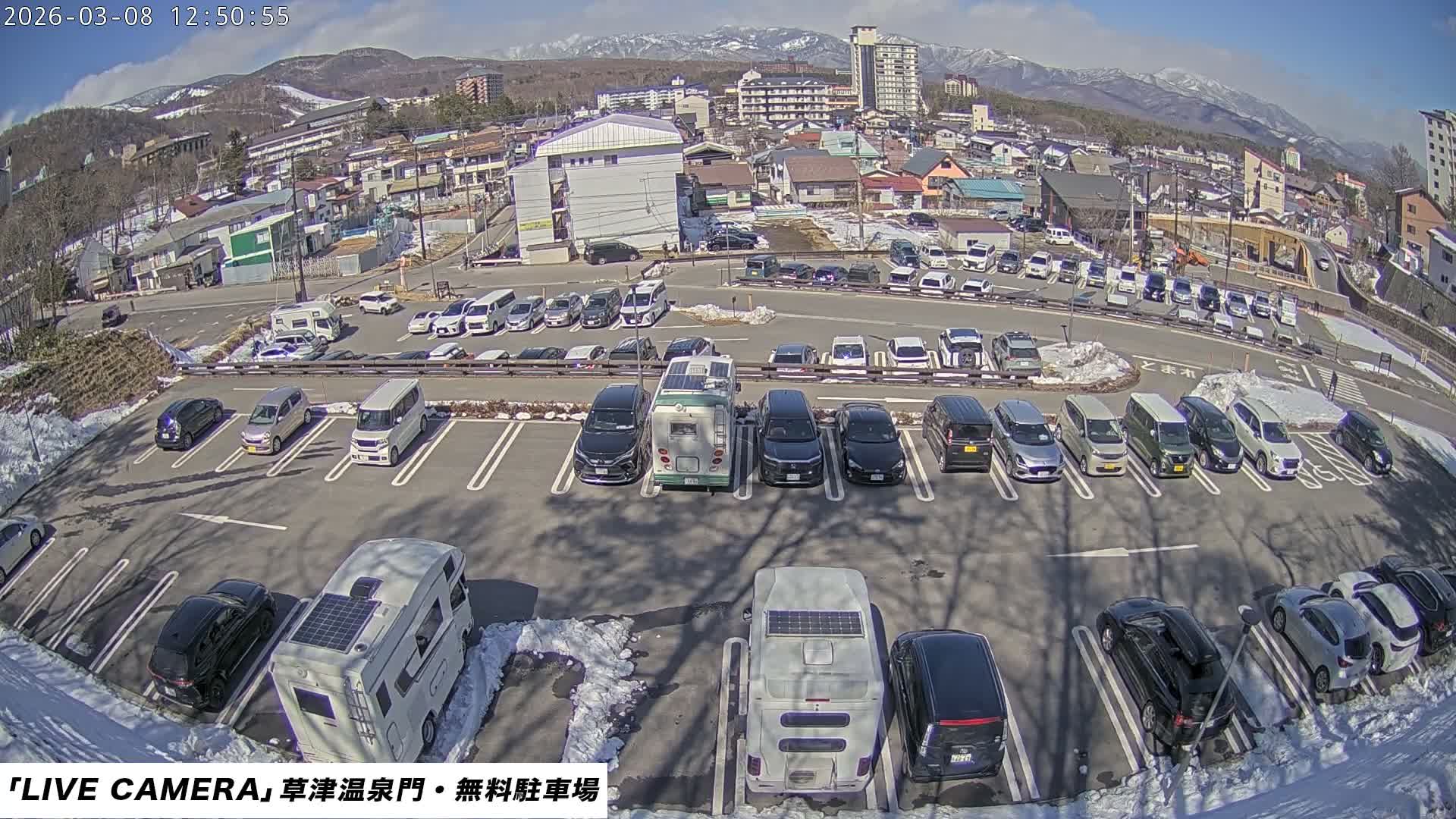 Gunma, Kusatsu Onsen Gate Car Parking Hot Spring Mon Parking Lot & Kusatsu Skyline View towards Northeast ( 群馬県草津温泉門前駐車場と北東方向の草津スカイラインの眺め ) Live Cam  - Kusatsu, Agatsuma-gun , Gunma, Kantō, Honshu, 