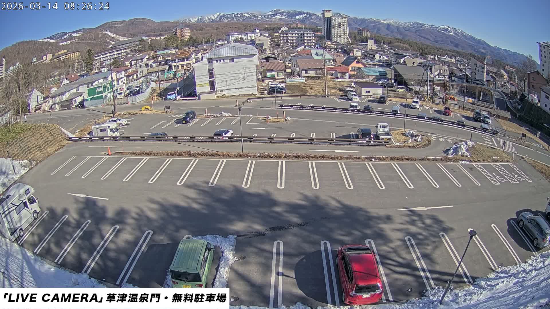Gunma, Kusatsu Onsen Gate Car Parking Hot Spring Mon Parking Lot & Kusatsu Skyline View towards Northeast ( 群馬県草津温泉門前駐車場と北東方向の草津スカイラインの眺め ) Live Cam  - Kusatsu, Agatsuma-gun , Gunma, Kantō, Honshu, 