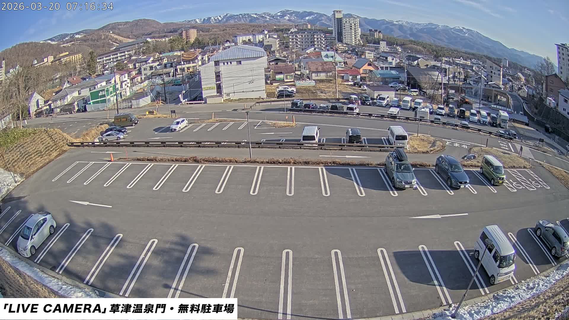 Gunma, Kusatsu Onsen Gate Car Parking Hot Spring Mon Parking Lot & Kusatsu Skyline View towards Northeast ( 群馬県草津温泉門前駐車場と北東方向の草津スカイラインの眺め ) Live Cam  - Kusatsu, Agatsuma-gun , Gunma, Kantō, Honshu, 