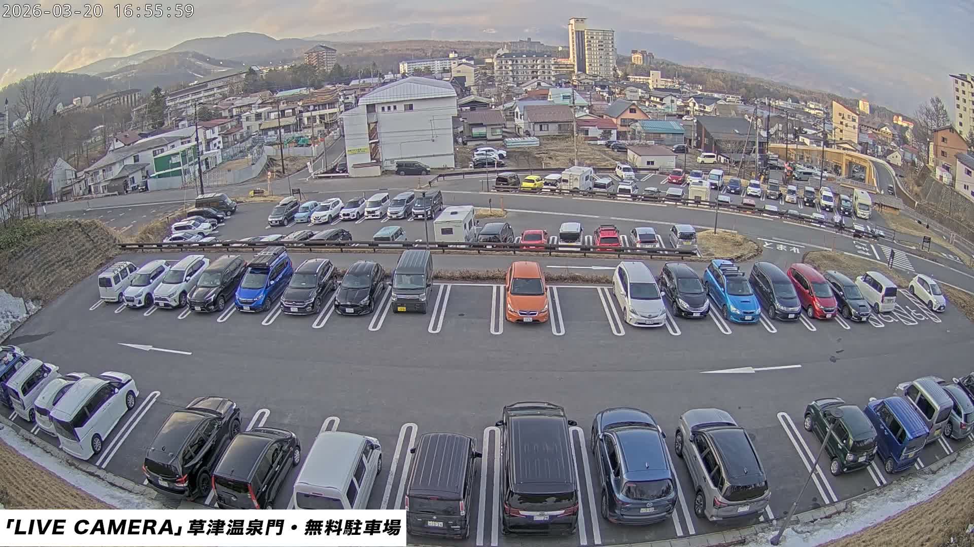 Gunma, Kusatsu Onsen Gate Car Parking Hot Spring Mon Parking Lot & Kusatsu Skyline View towards Northeast ( 群馬県草津温泉門前駐車場と北東方向の草津スカイラインの眺め ) Live Cam  - Kusatsu, Agatsuma-gun , Gunma, Kantō, Honshu, 