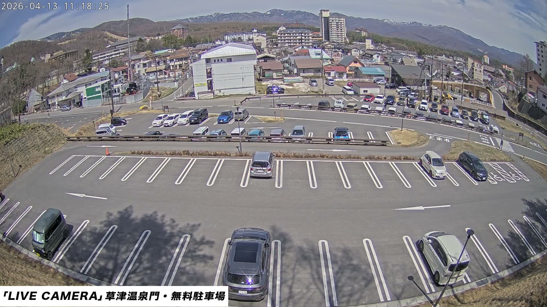Gunma, Kusatsu Onsen Gate Car Parking Hot Spring Mon Parking Lot & Kusatsu Skyline View towards Northeast ( 群馬県草津温泉門前駐車場と北東方向の草津スカイラインの眺め ) Live Cam  - Kusatsu, Agatsuma-gun , Gunma, Kantō, Honshu, 