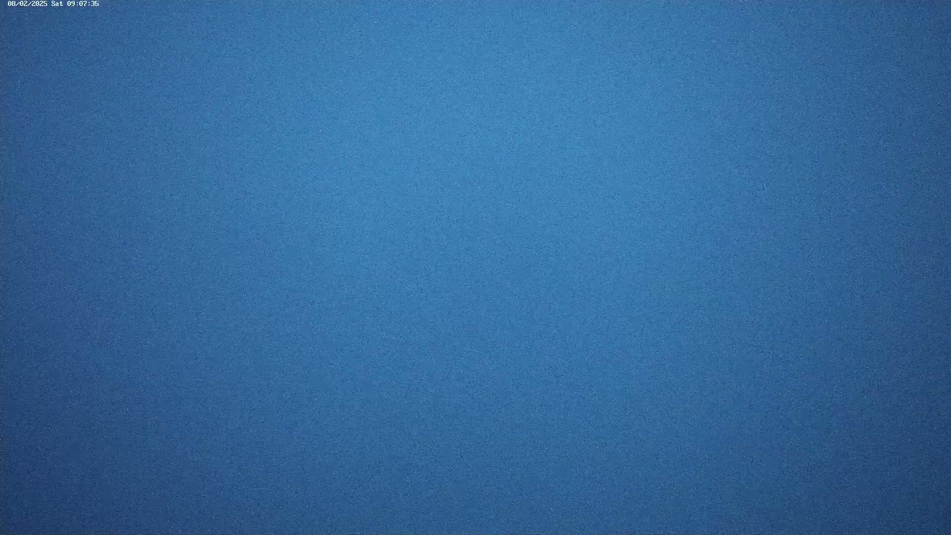 The image shows a solid, textured blue surface.