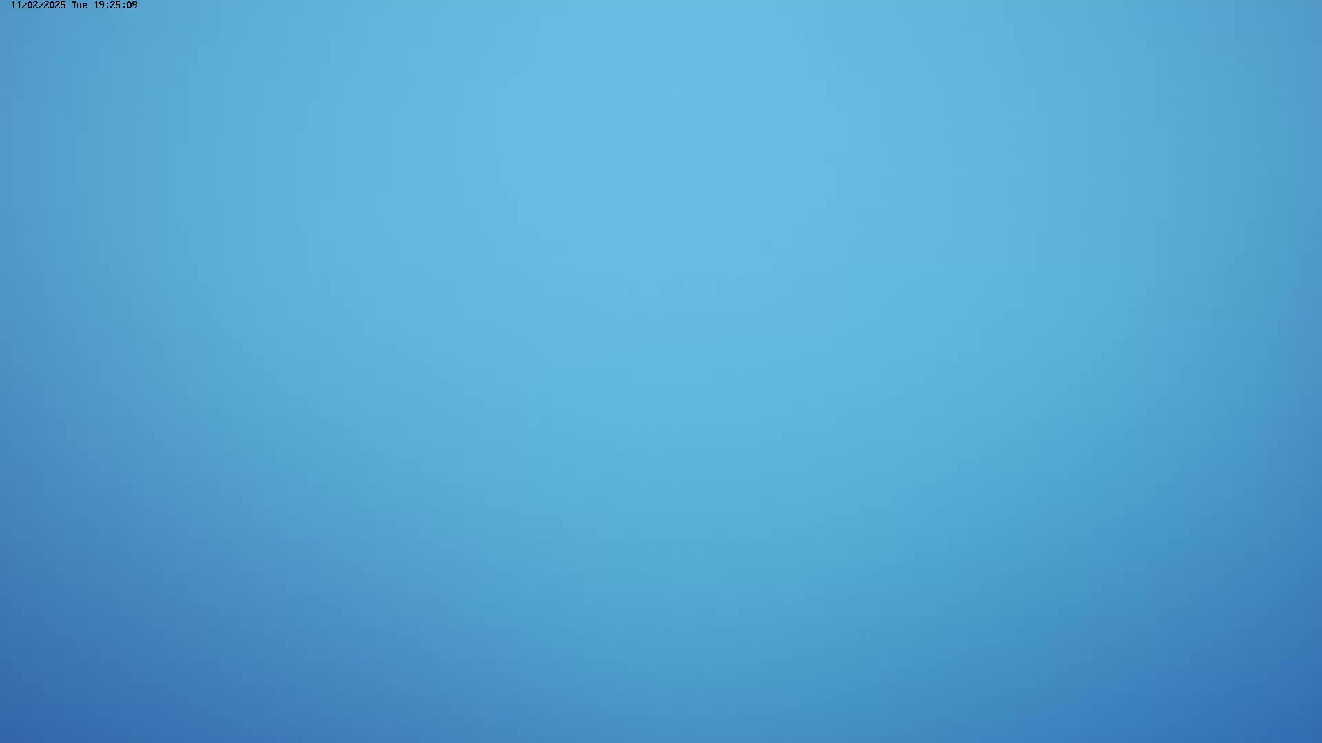 The image shows a solid, light-blue sky.