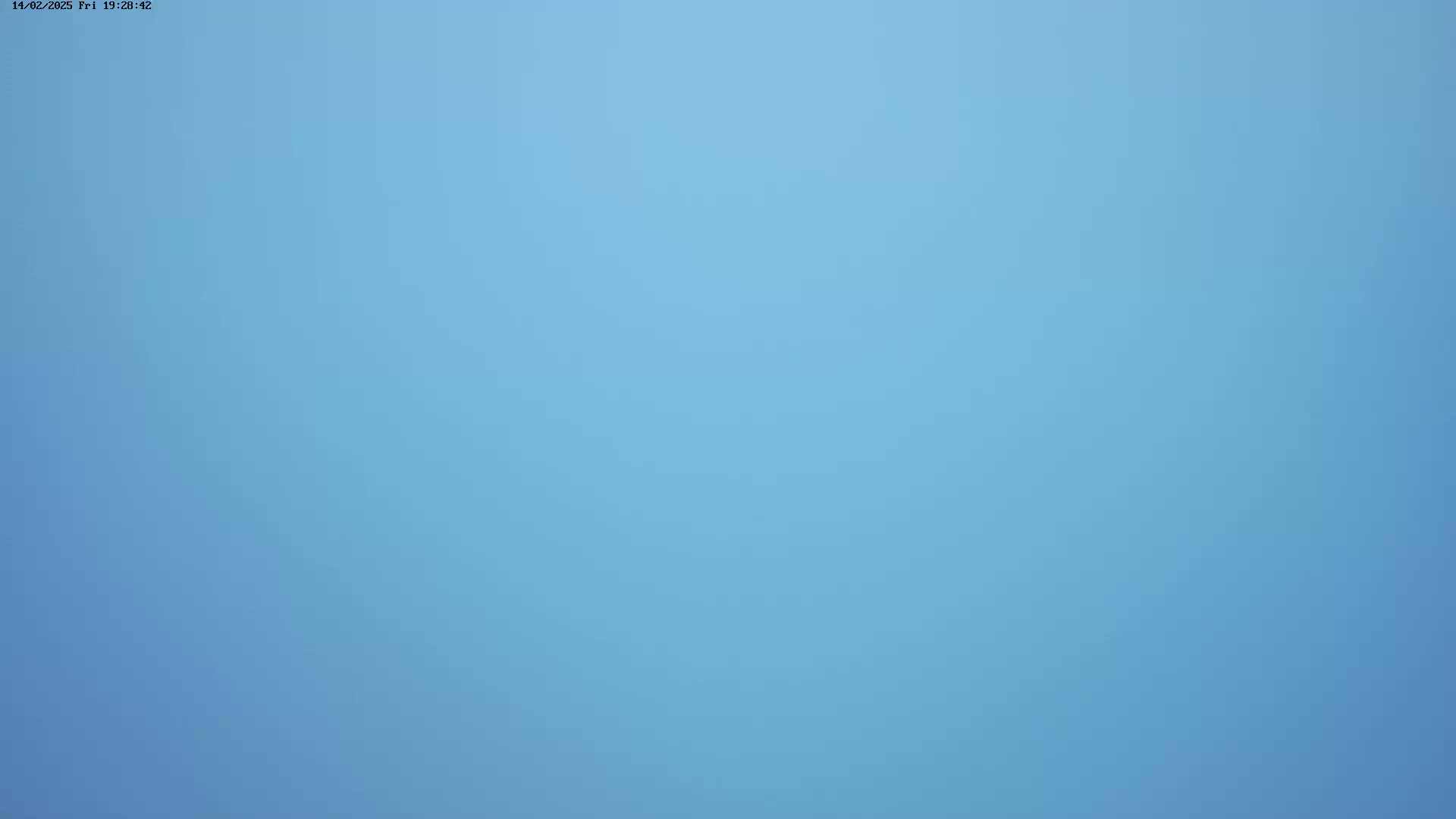 A solid, light-blue sky is shown.