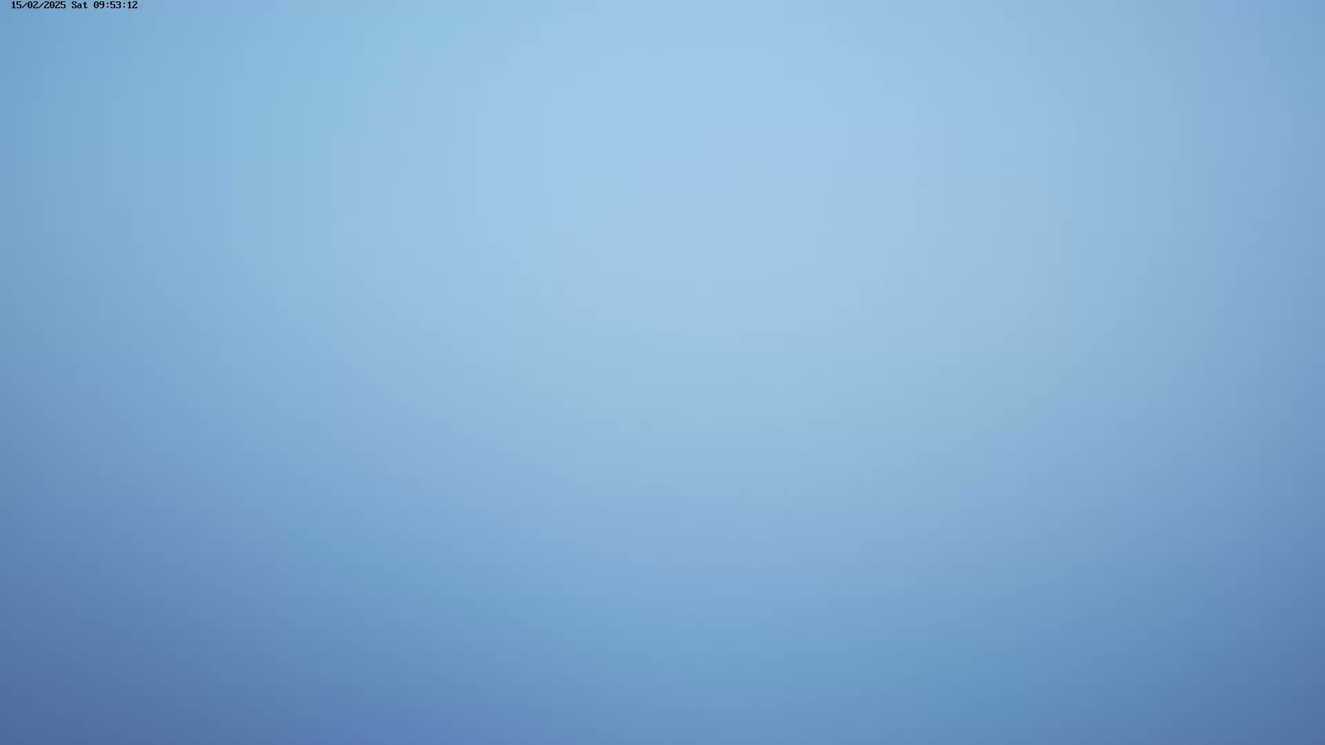 The image shows a solid, light blue sky.