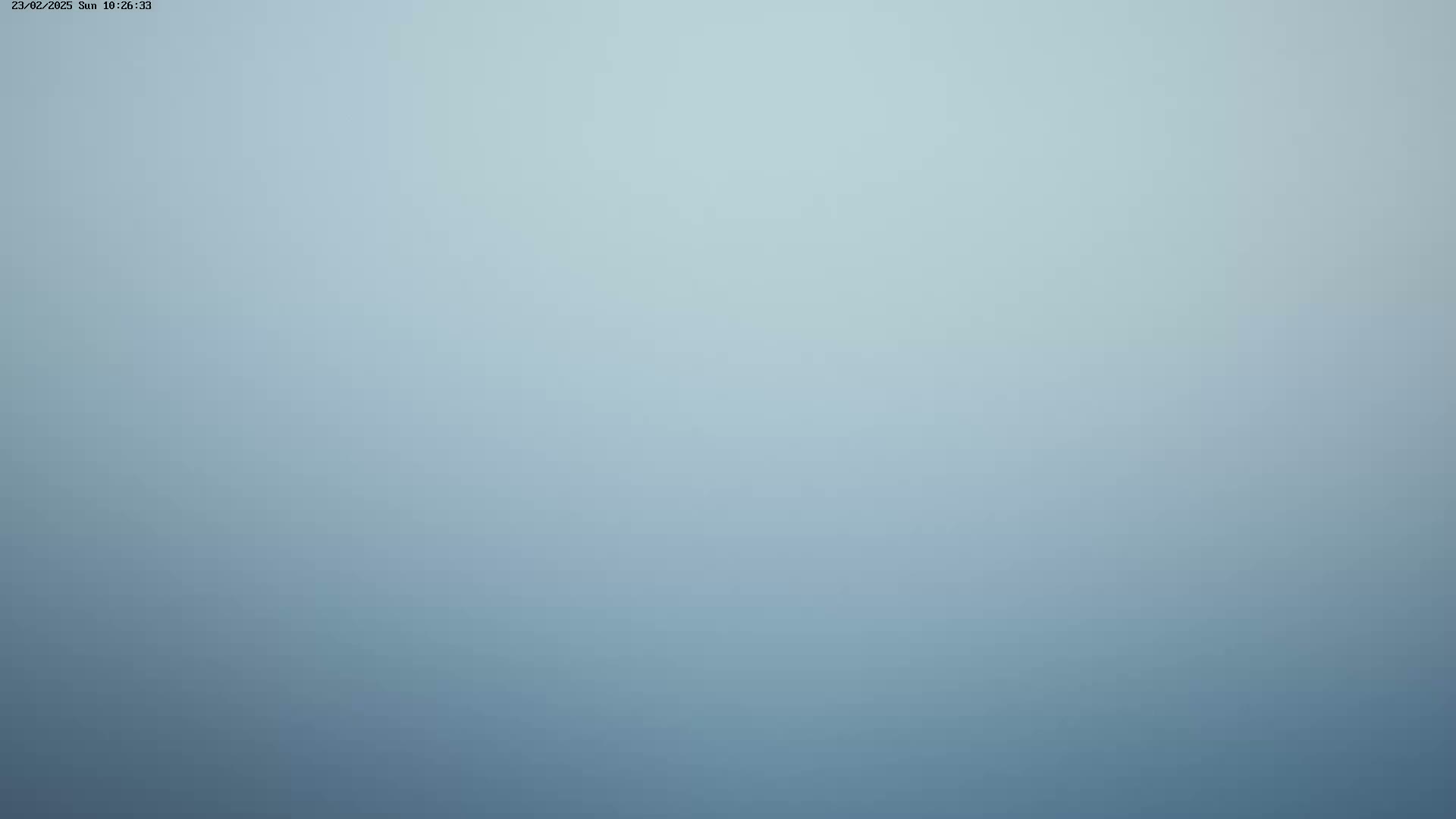 A uniformly light blue, hazy image fills the entire frame.