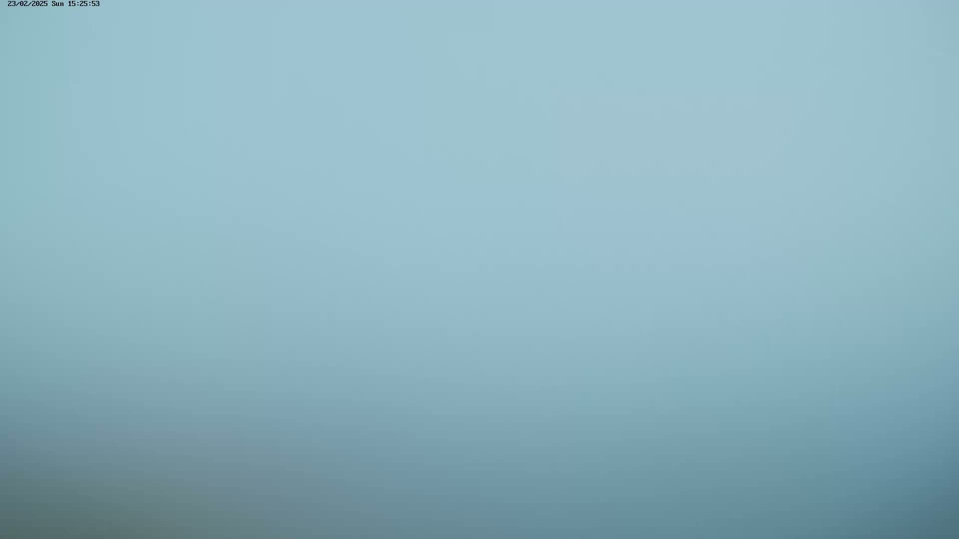 A solid, light-blue background.