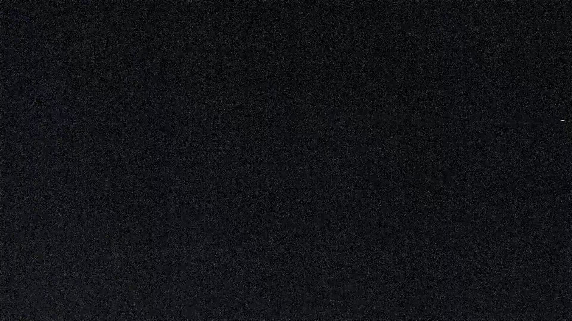 The image shows a dark, uniformly textured surface.
