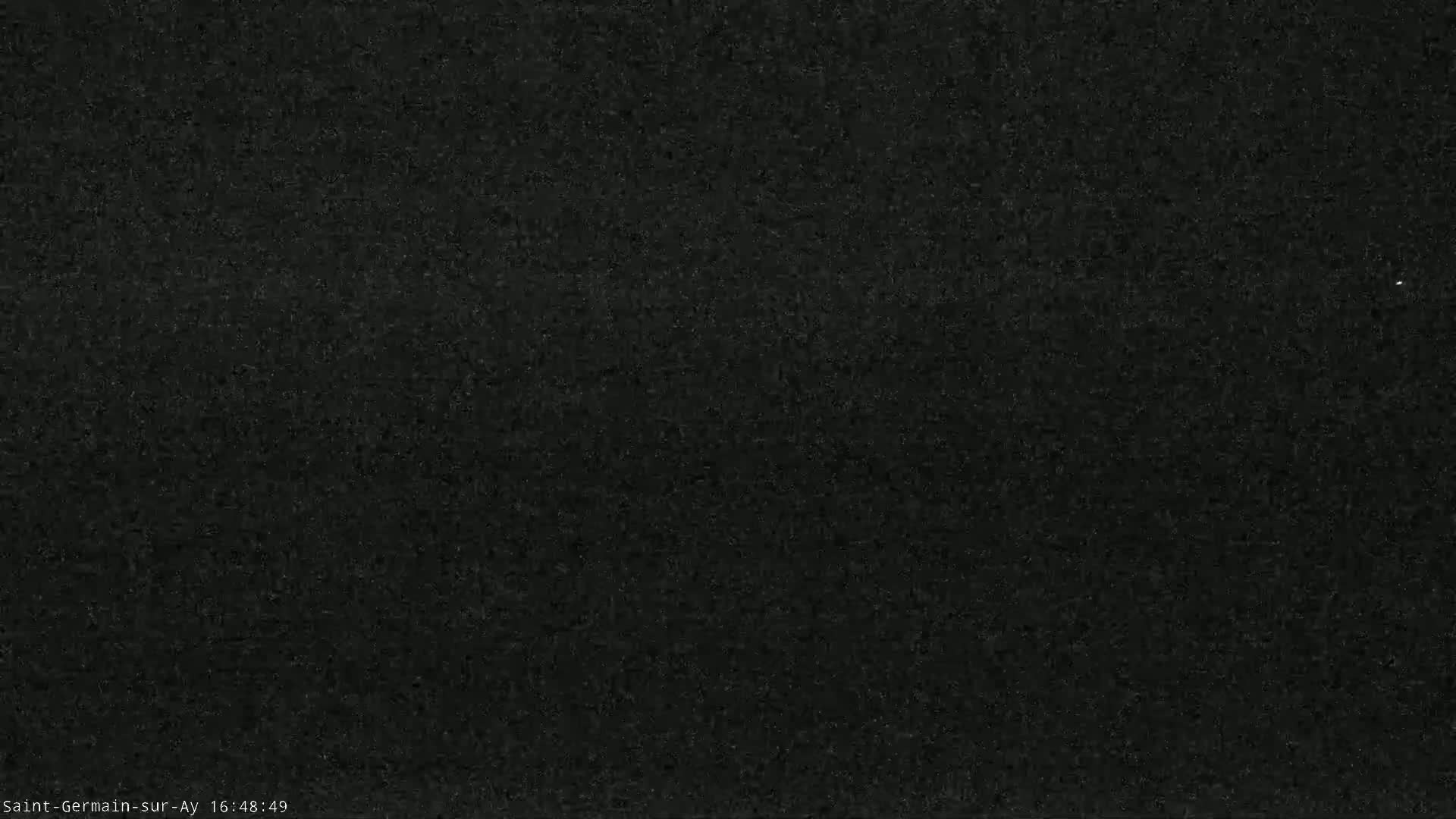 The image shows a uniformly dark gray or black textured surface.