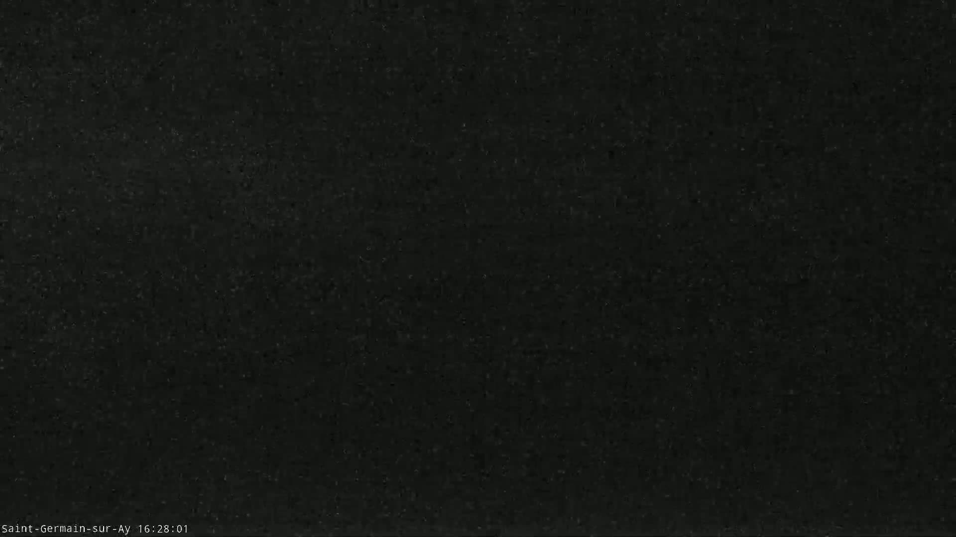 The image shows a dark, uniformly textured surface.