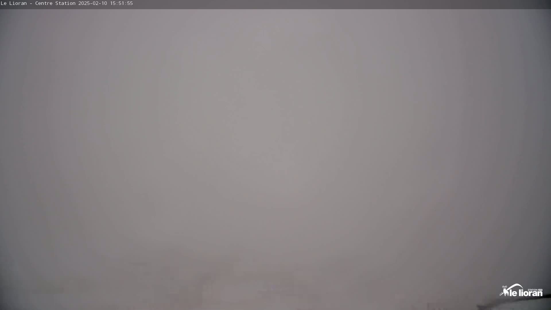 A very foggy or hazy scene is visible.