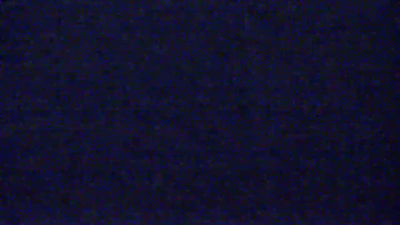 The image shows a dark blue, textured surface.