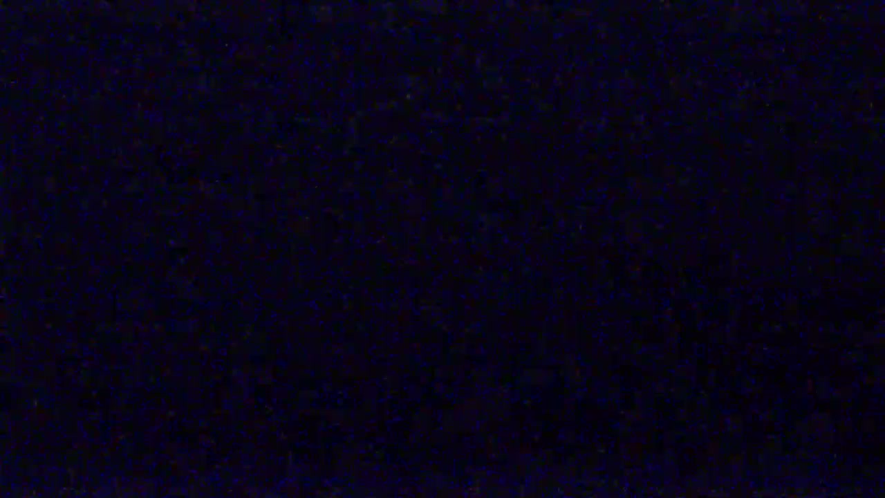 The image shows a dark blue, textured surface.