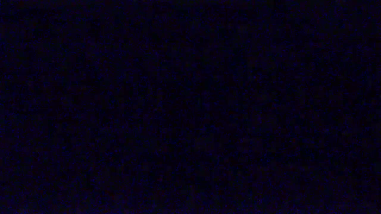 The image shows a dark blue textured surface.