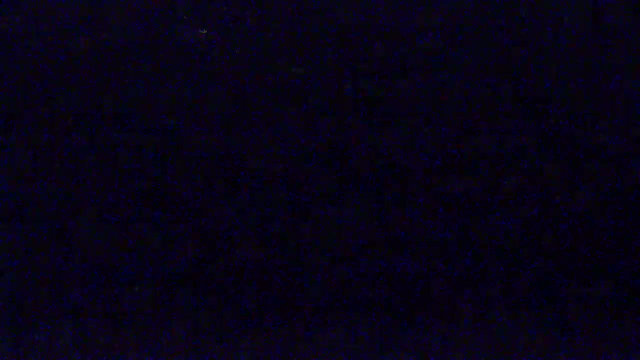 The image shows a dark, uniformly textured surface.