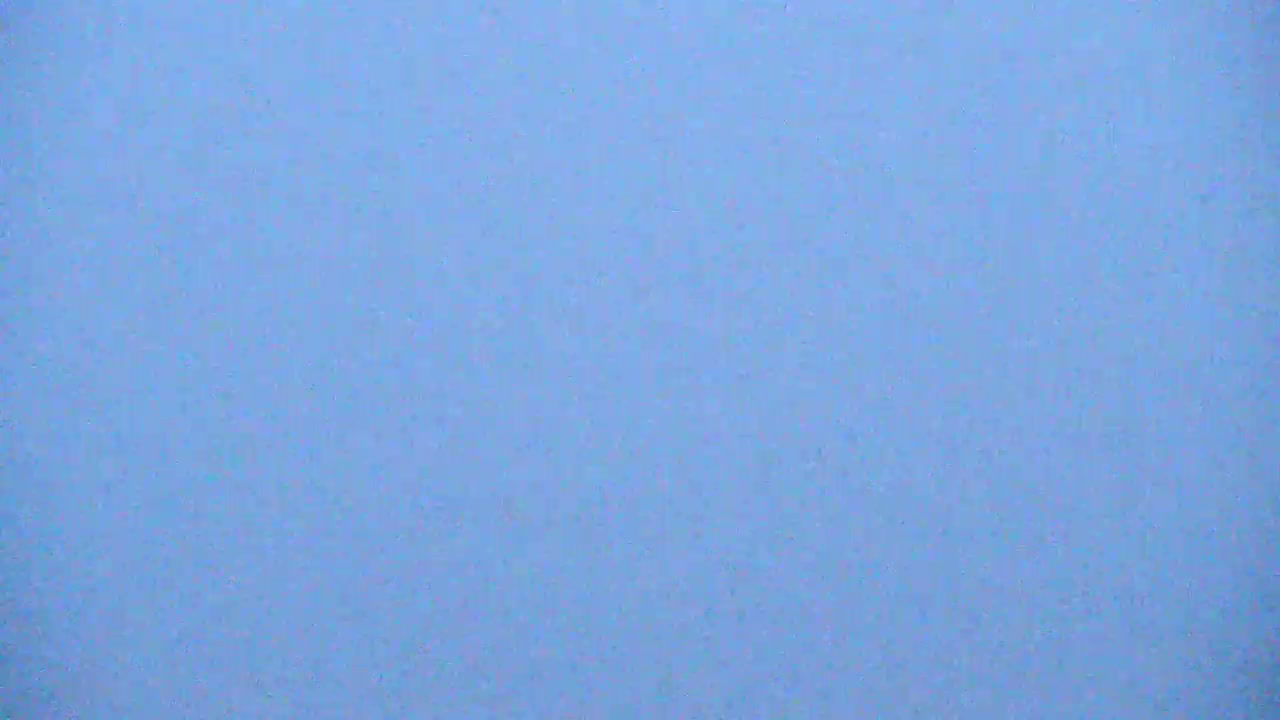 The image shows a uniformly light blue surface.