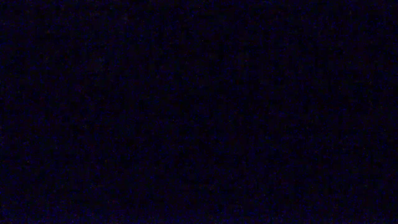 The image shows a dark blue textured surface.