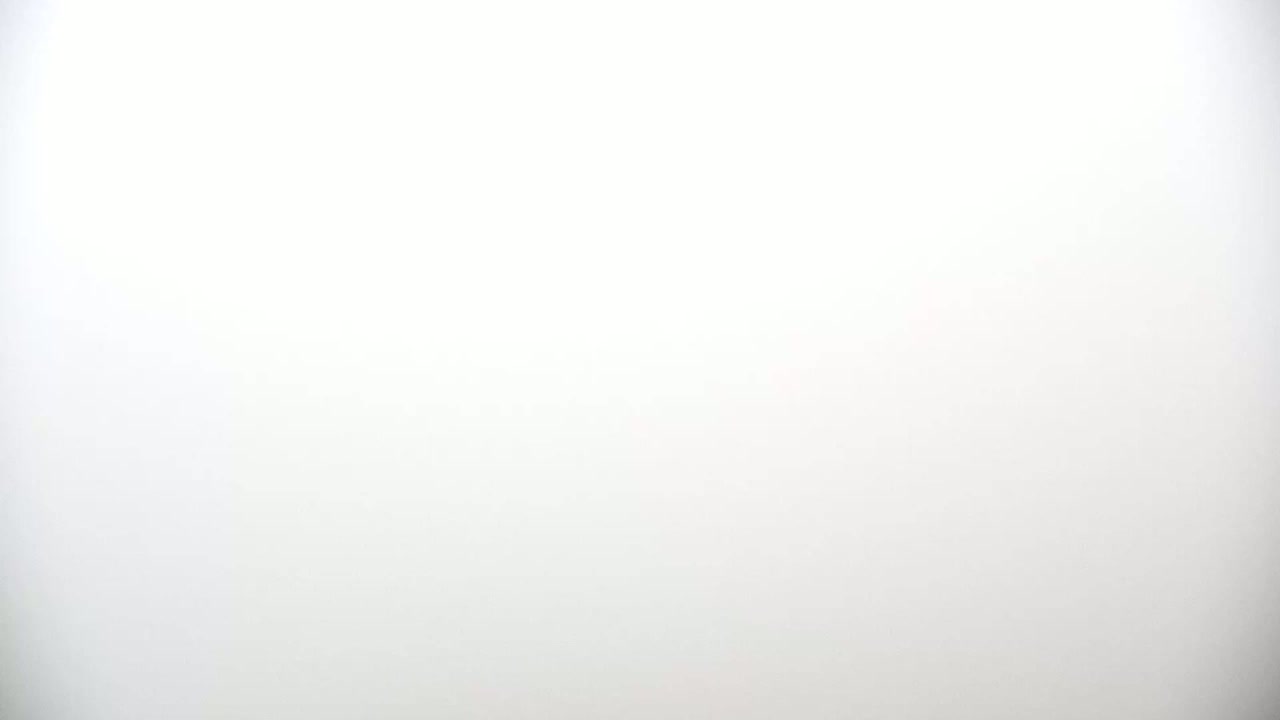 The image shows a uniformly light gray or white background.