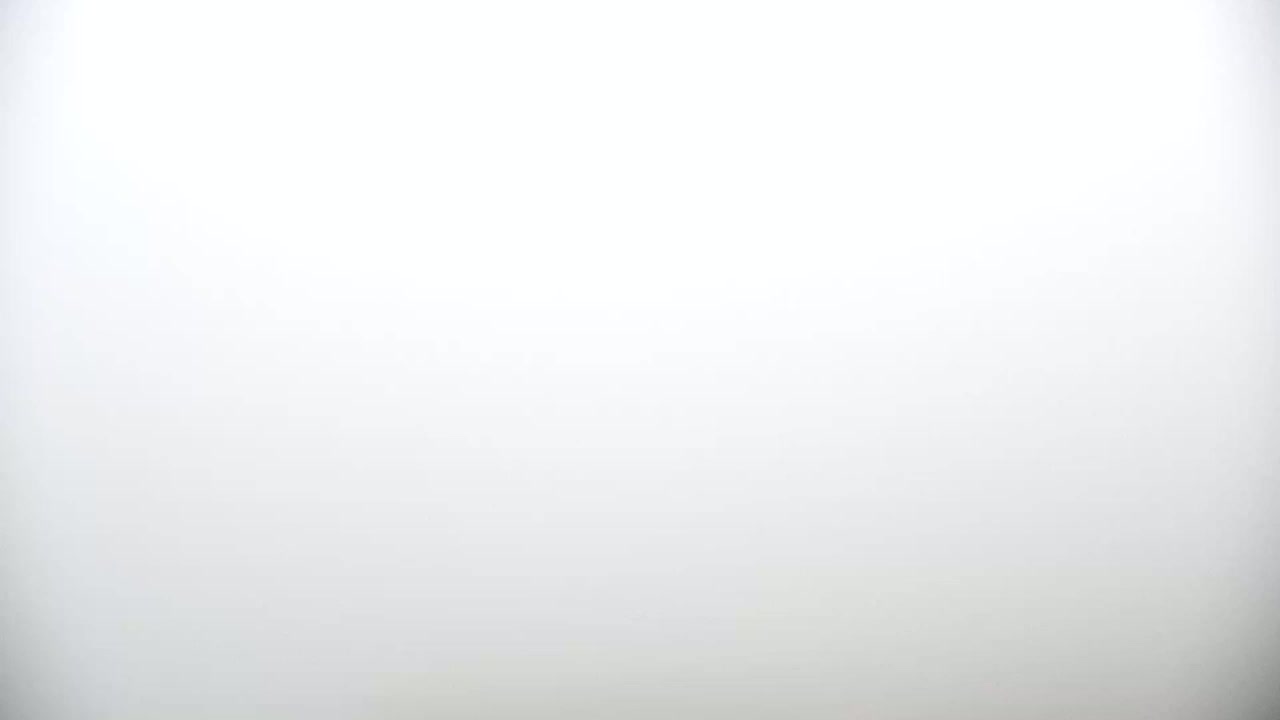 The image shows a solid, off-white background.