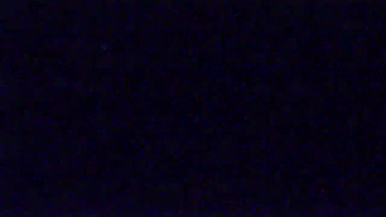 The image shows a dark blue textured surface.