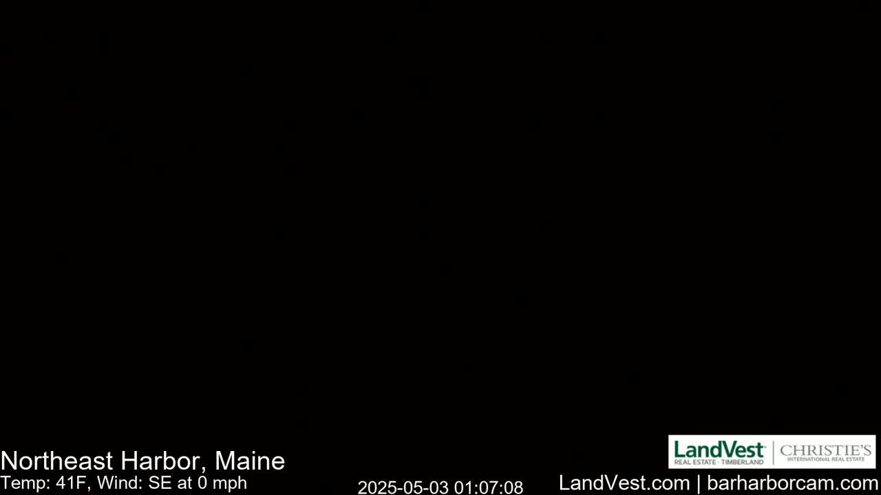 A completely black image depicts a nighttime scene with a temperature of 41°F and a calm southeast wind.