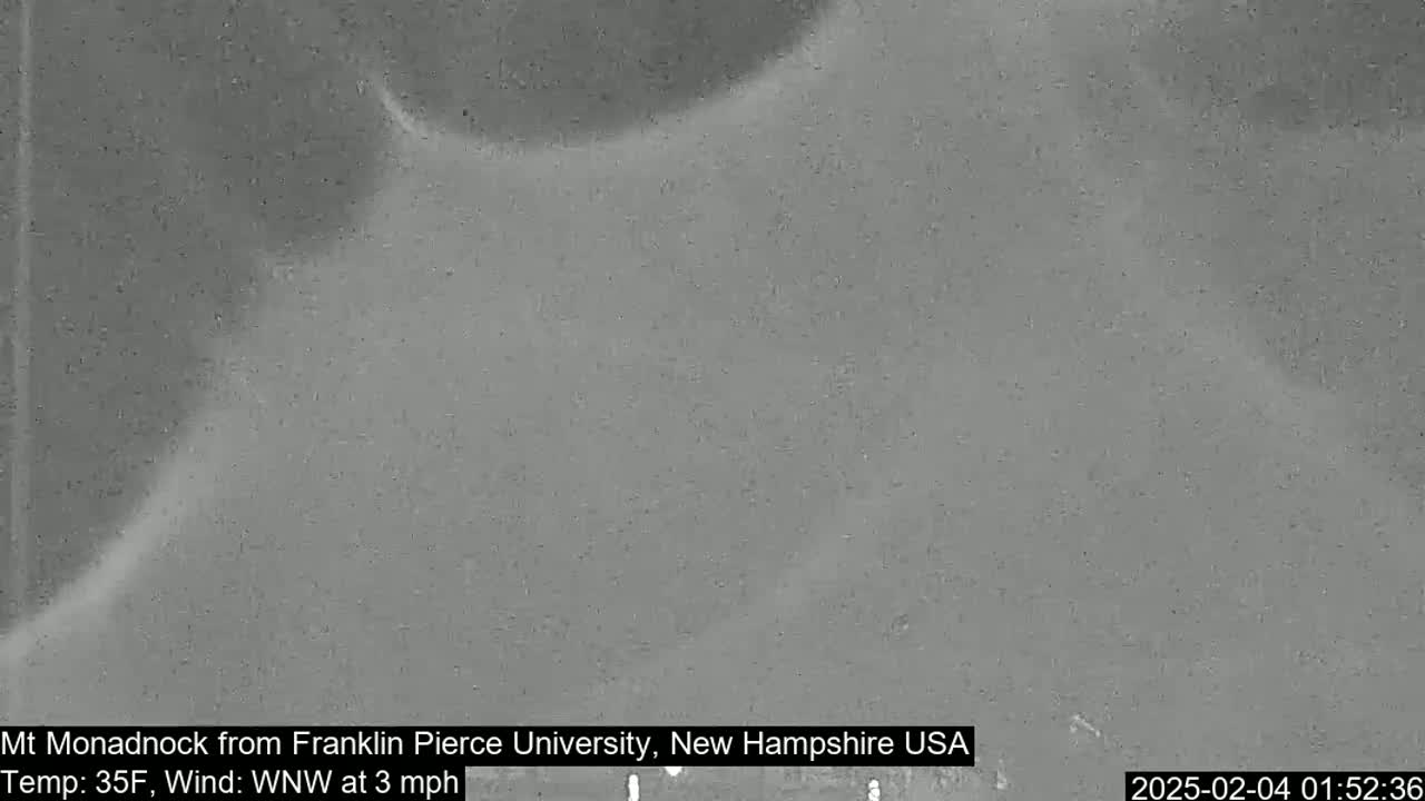 A grainy, low-visibility image shows a mostly obscured mountainside in 35°F weather with a west-northwest wind at 3 mph.