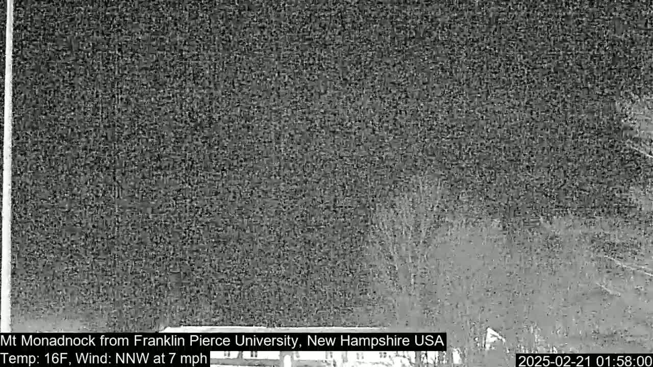 A nighttime, low-visibility image shows a blurry landscape with a 16°F temperature and a 7 mph north-northwest wind.