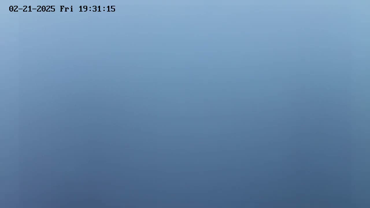 A solid, light-blue colored image depicts an overcast sky.