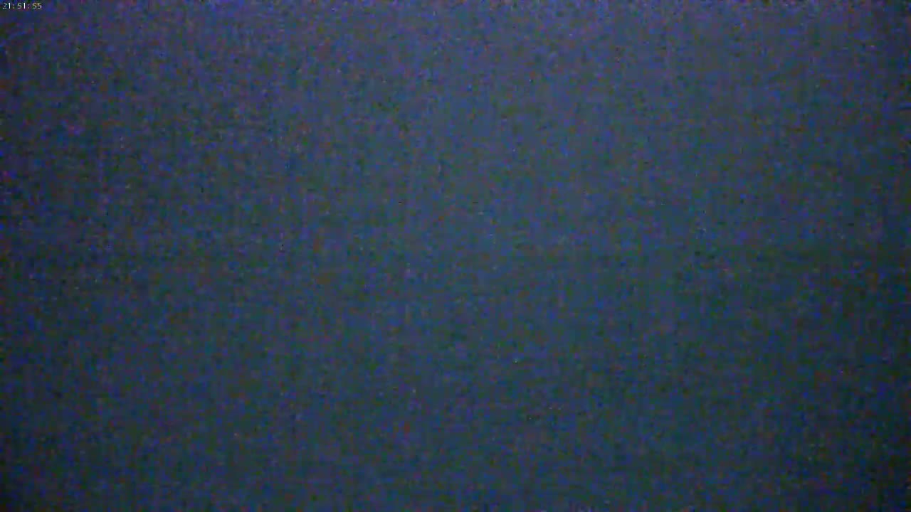 The image shows a dark blue, textured surface.