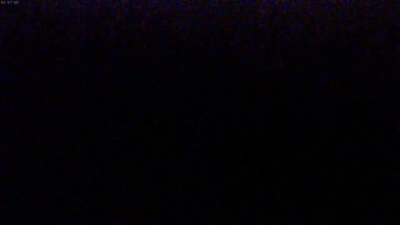 The image is completely black, possibly depicting nighttime conditions.