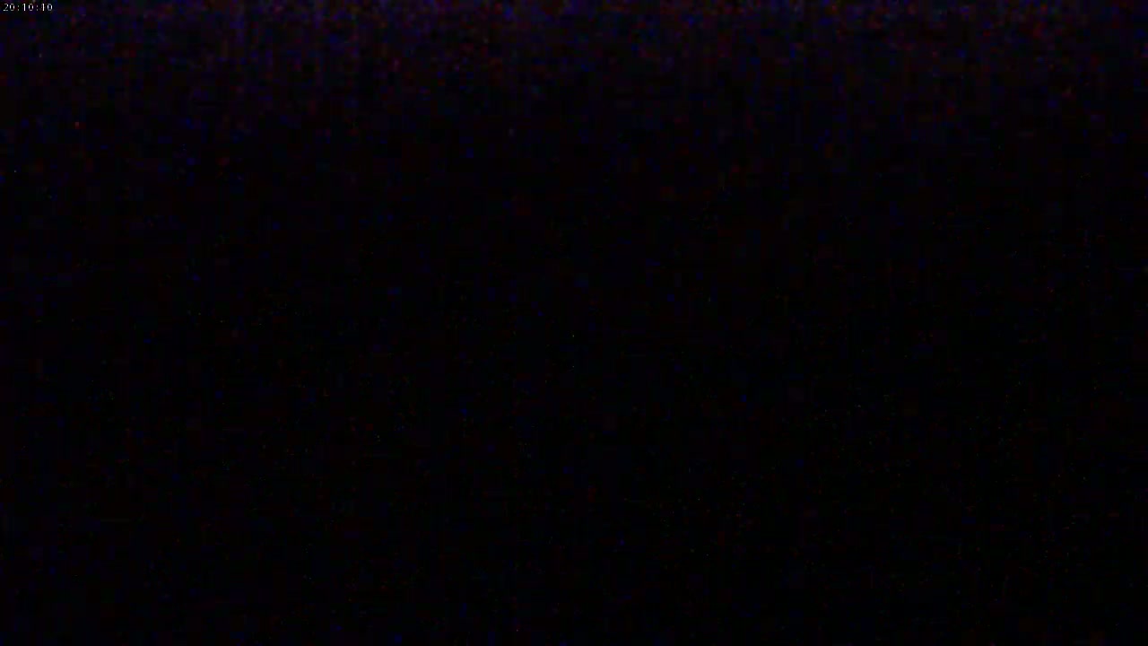 The image shows a completely black screen with slight variations in shading.