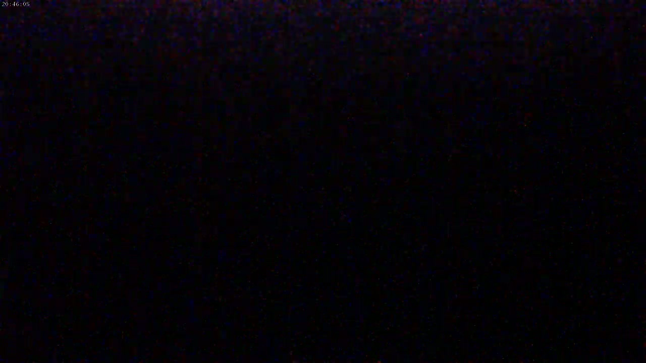 The image shows a completely dark scene.