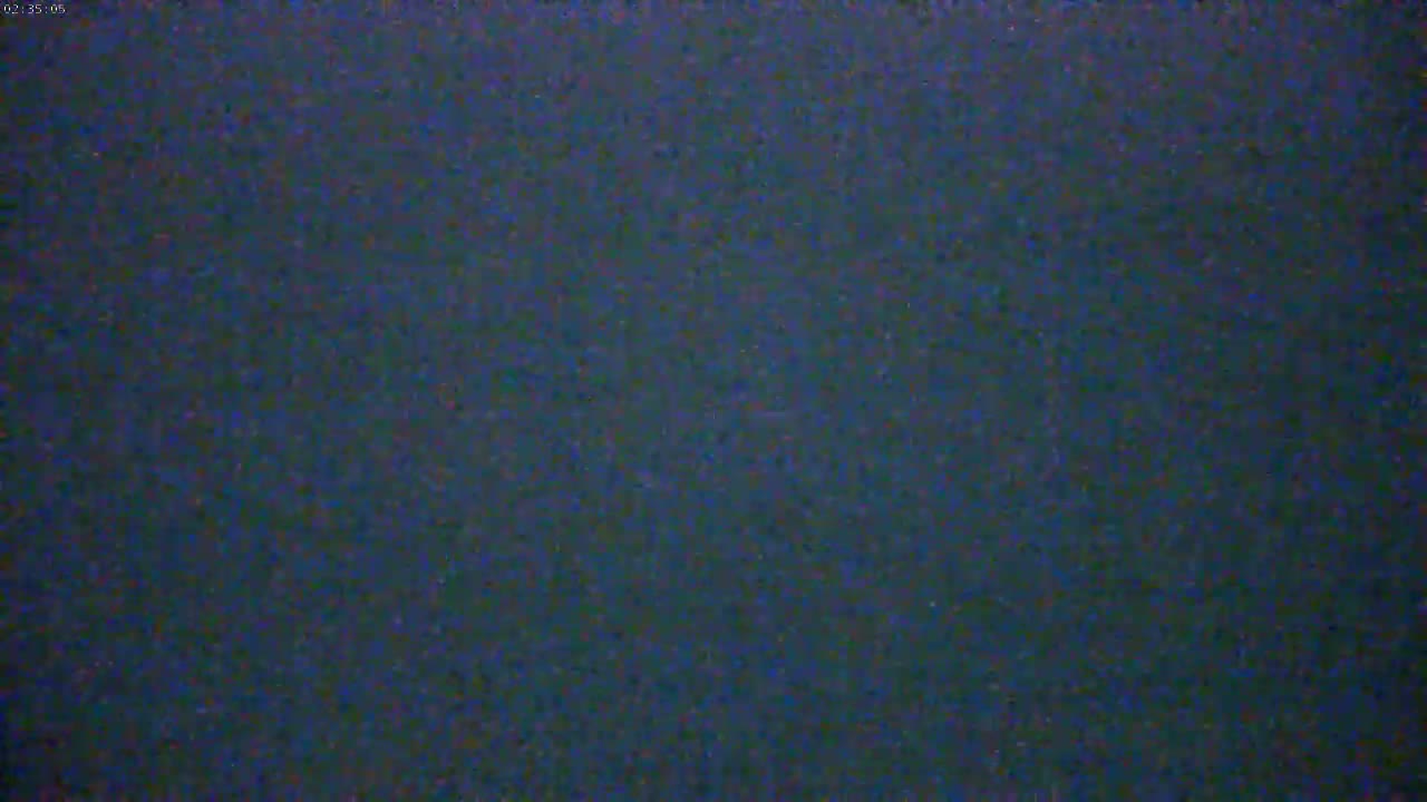 The image shows a dark, uniformly textured surface.
