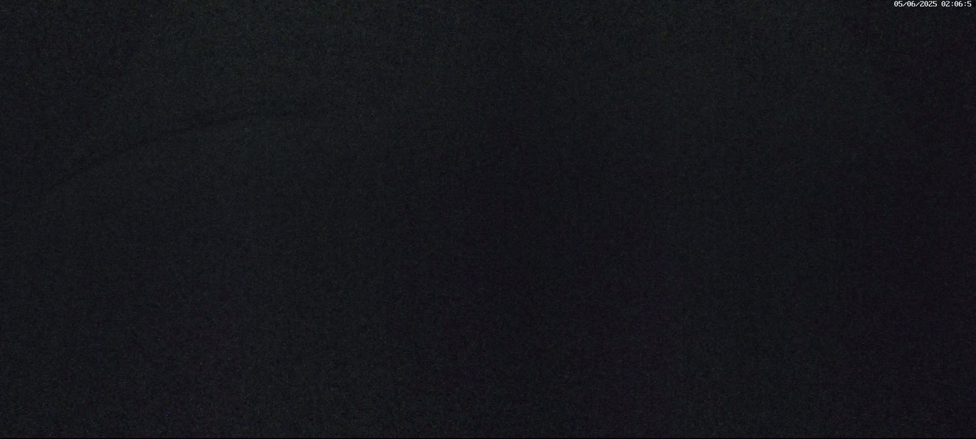 The image shows a uniformly dark, textured surface.