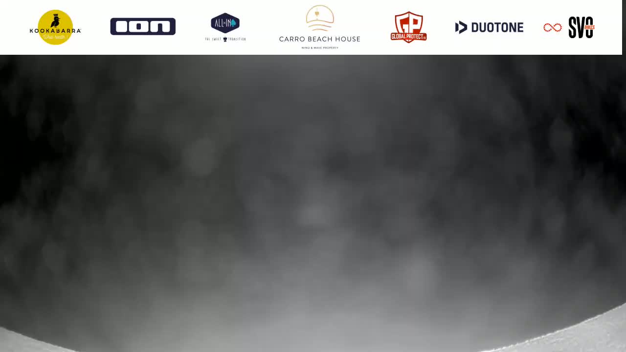 A dark gray, hazy cloud of steam or smoke fills most of the frame.