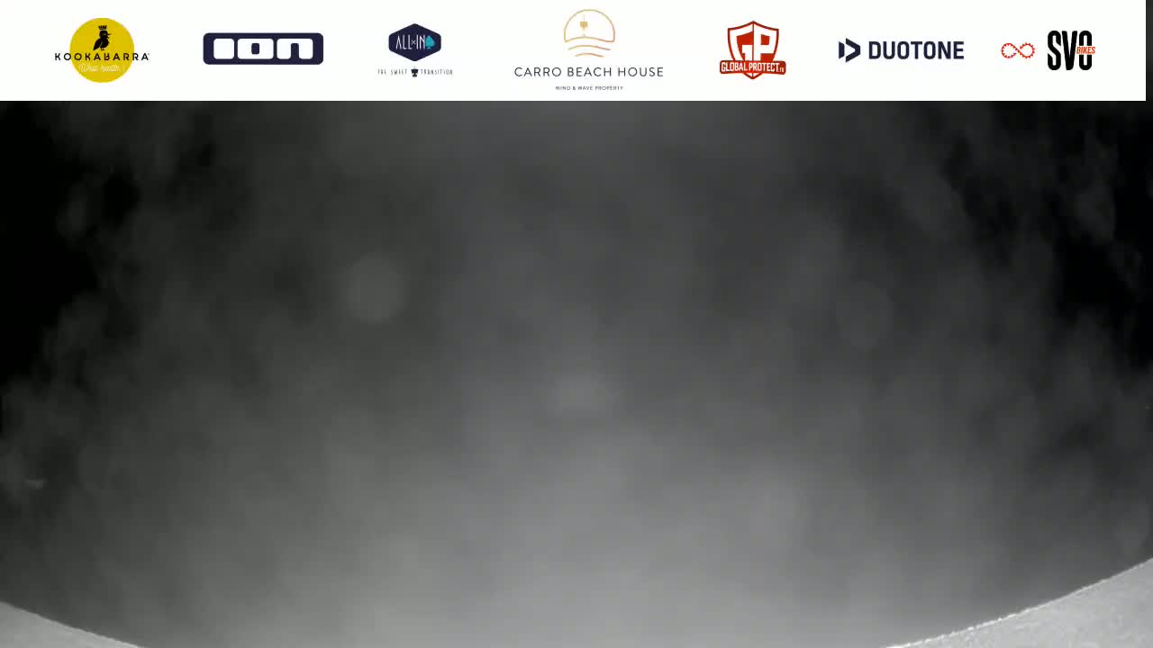 A blurry, dark gray image shows a foggy or hazy sky.