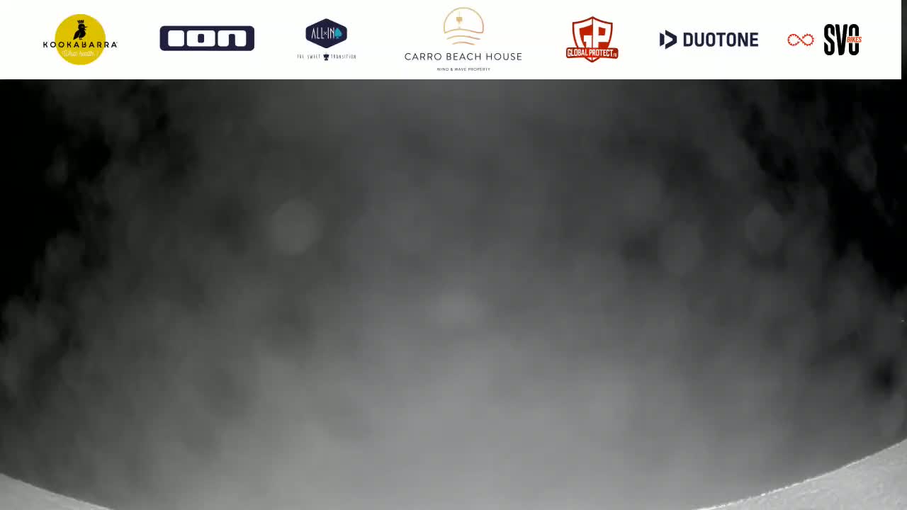 A low-visibility, foggy scene is shown.