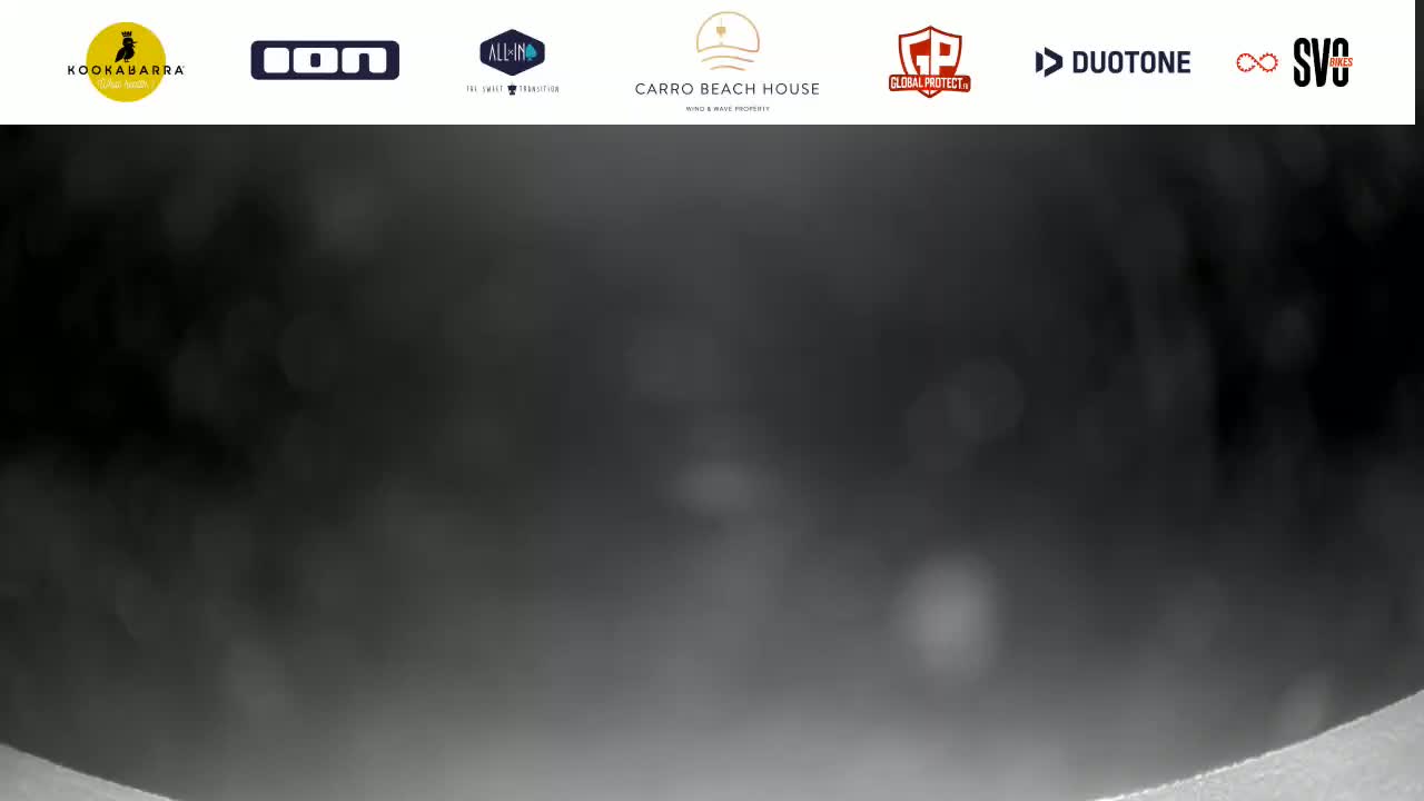 A blurry, dark gray image shows what appears to be heavy fog or mist.