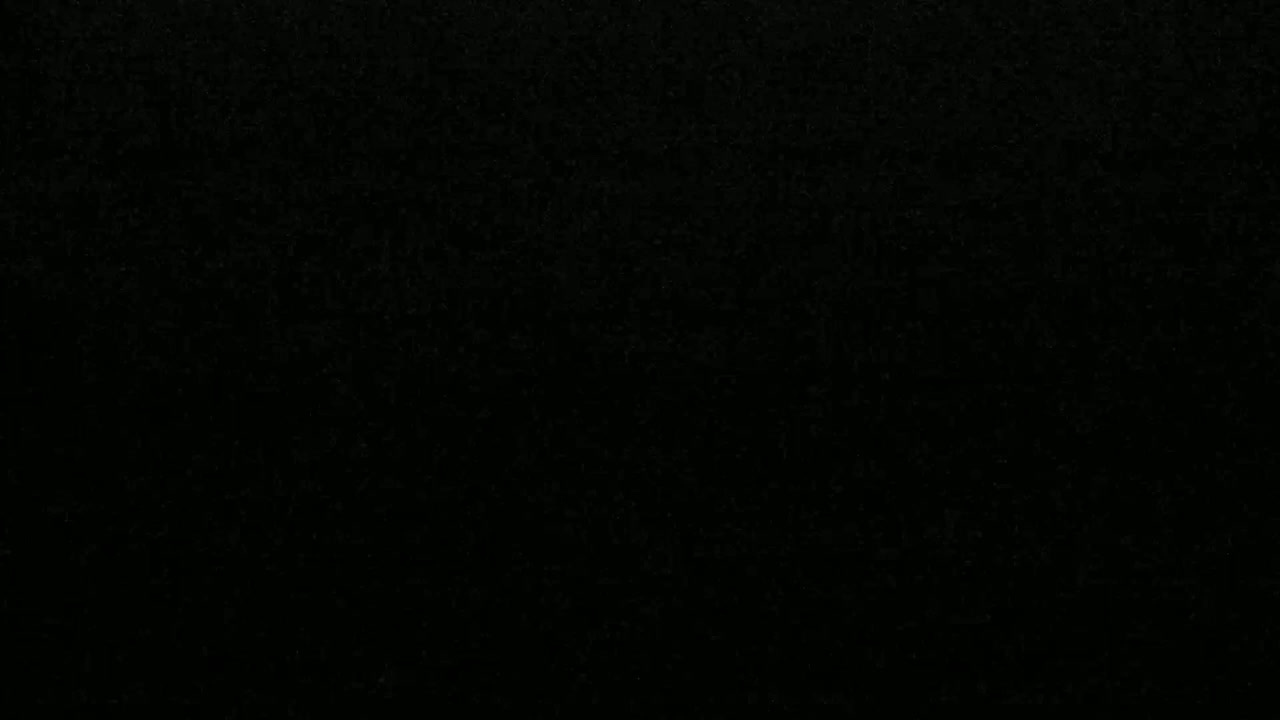 The image shows a uniformly dark, textured surface.