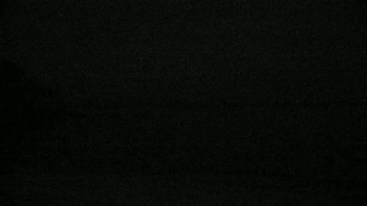 The image shows a uniformly dark, textured surface.