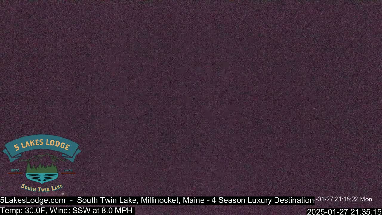 A dark purple screen shows a mostly obscured view of an outdoor scene at 30°F with a southwest wind of 8 mph.