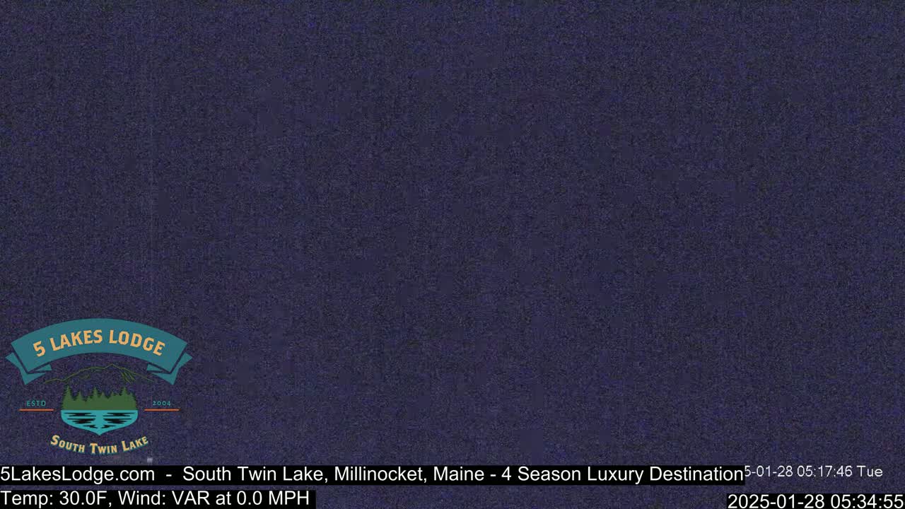 A dark blue, somewhat grainy image shows a nighttime, calm scene with a temperature of 30°F and no wind.