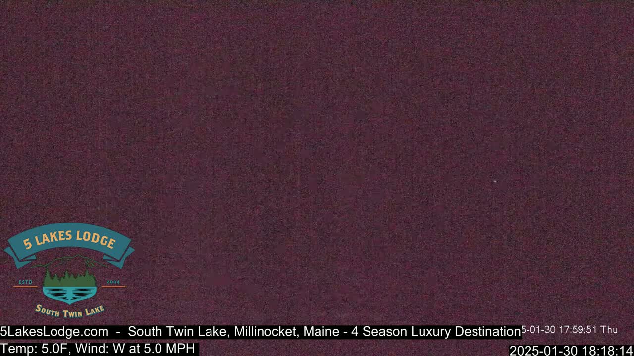A dark purple screen displays a still image of a nighttime scene.