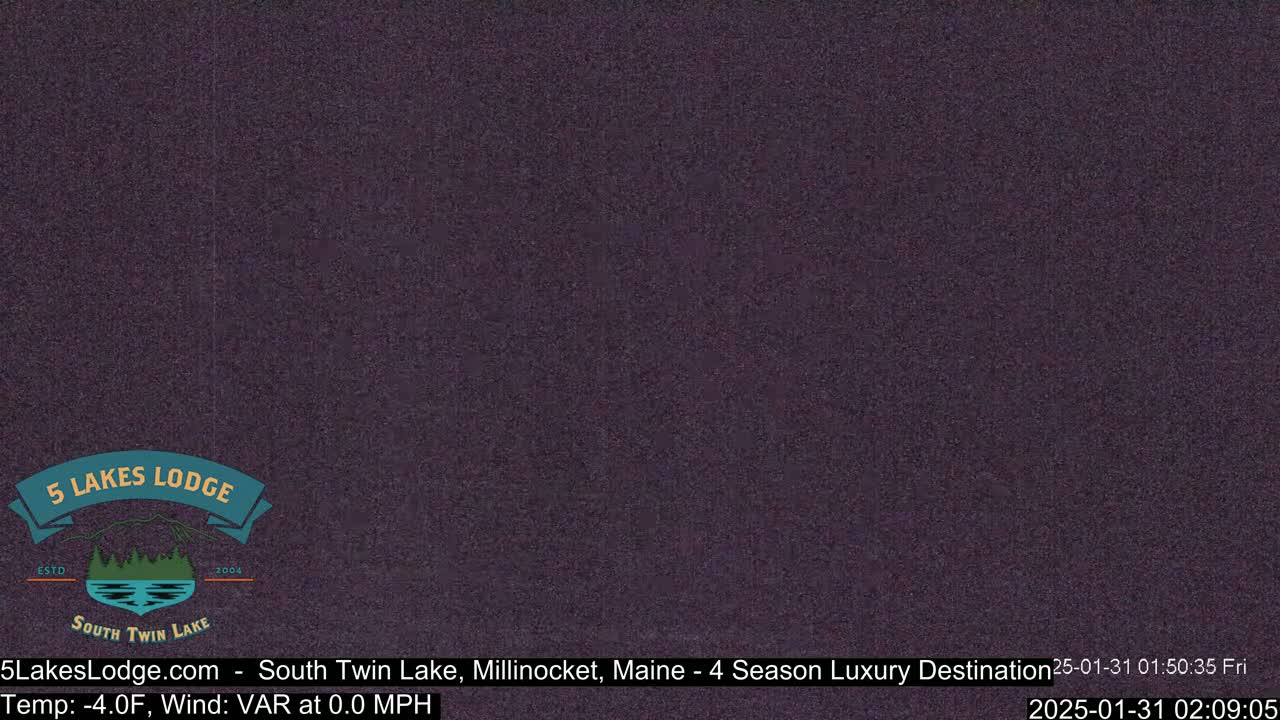 A dark purple screen shows a static image.
