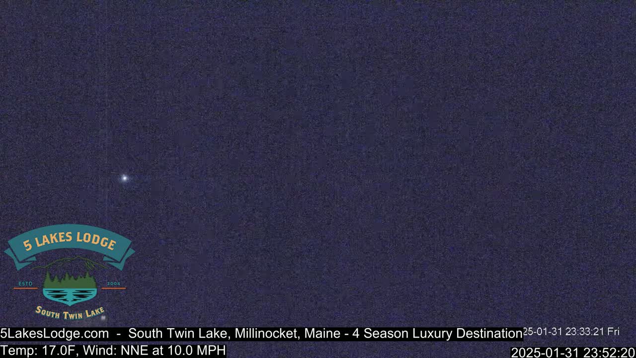 A dark, nighttime outdoor scene shows a single bright star in a mostly clear, dark blue sky with a 10 mph wind.
