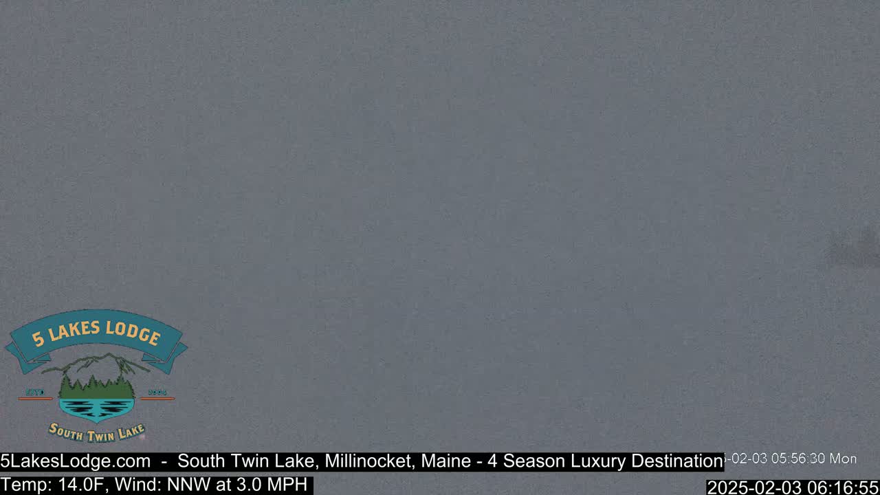 A mostly overcast, gray sky with a temperature of 14°F and a north-northwest wind at 3.0 mph.
