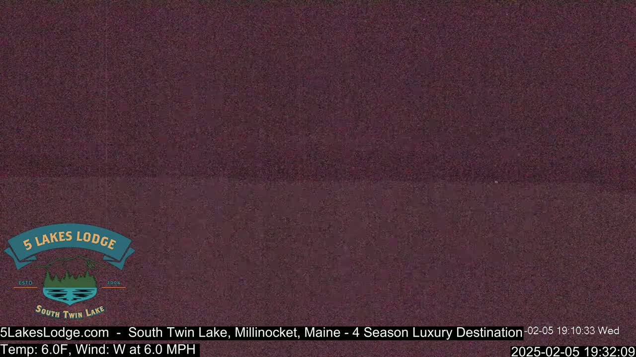 A dark, blurry image shows an overcast sky.