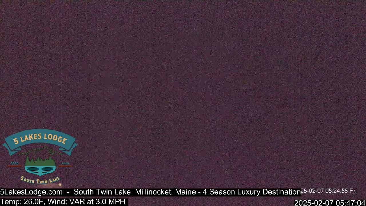 A dark purple screen with a logo displaying a lake and mountains.